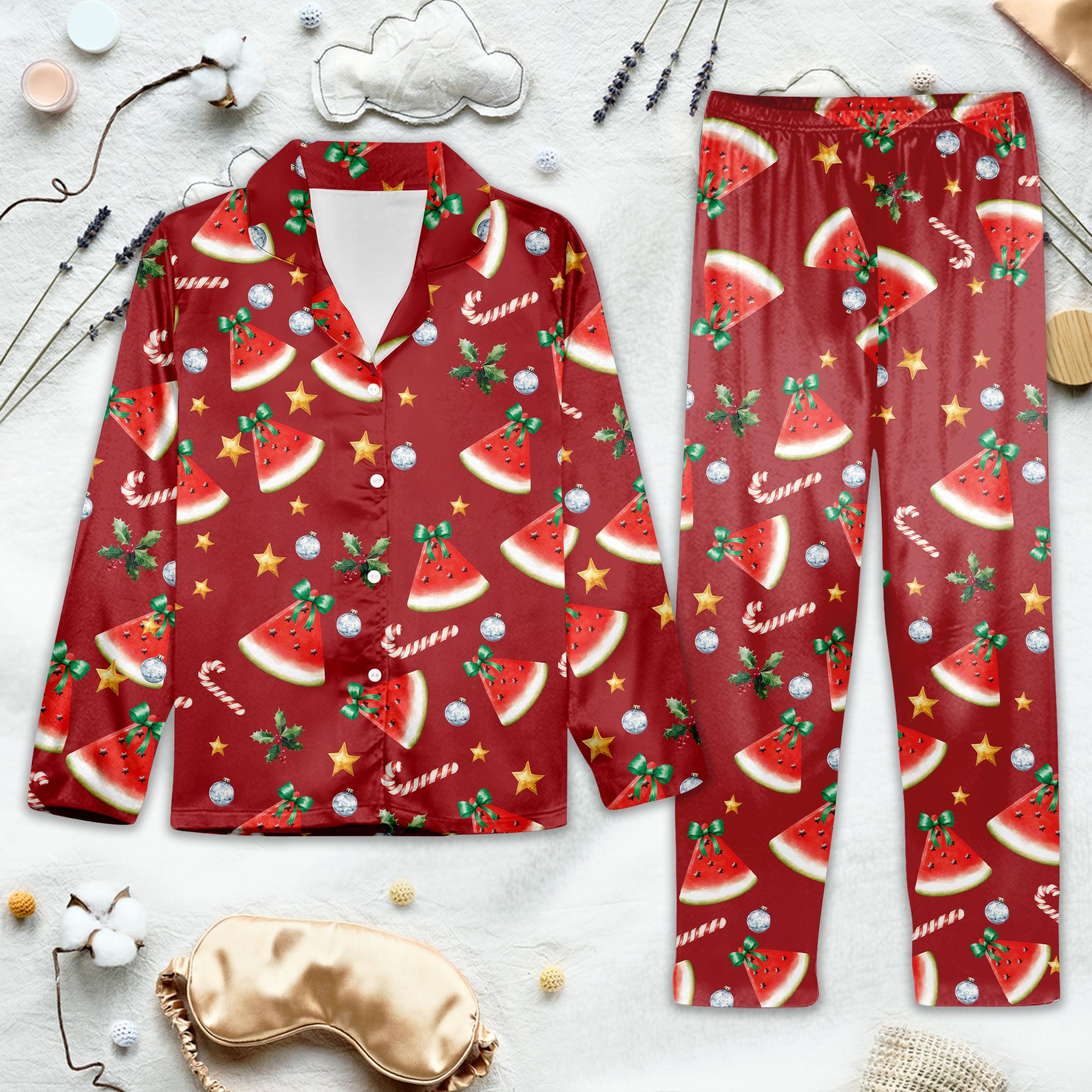 Red pajama set with watermelon and Christmas-themed pattern on a light gray background.