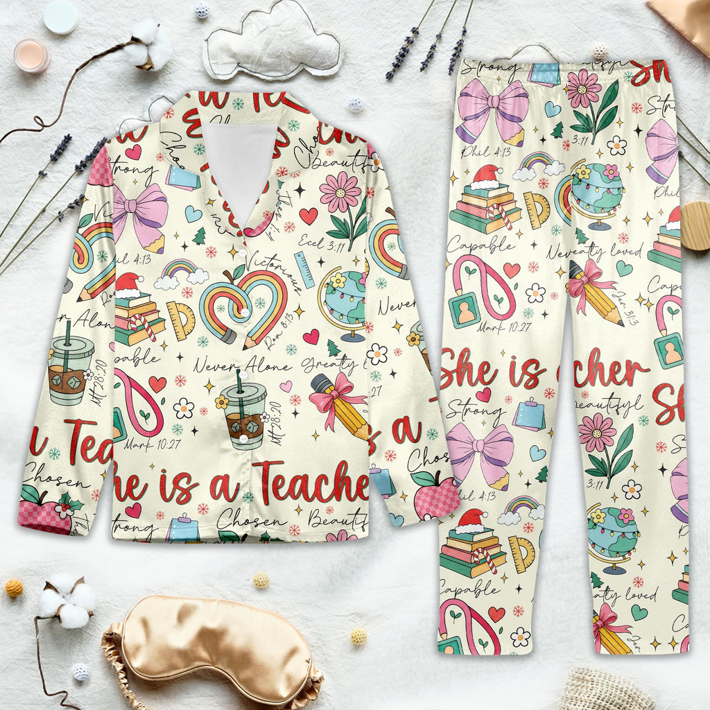 Colorful pajama set with teacher-themed design and stationery graphics. 