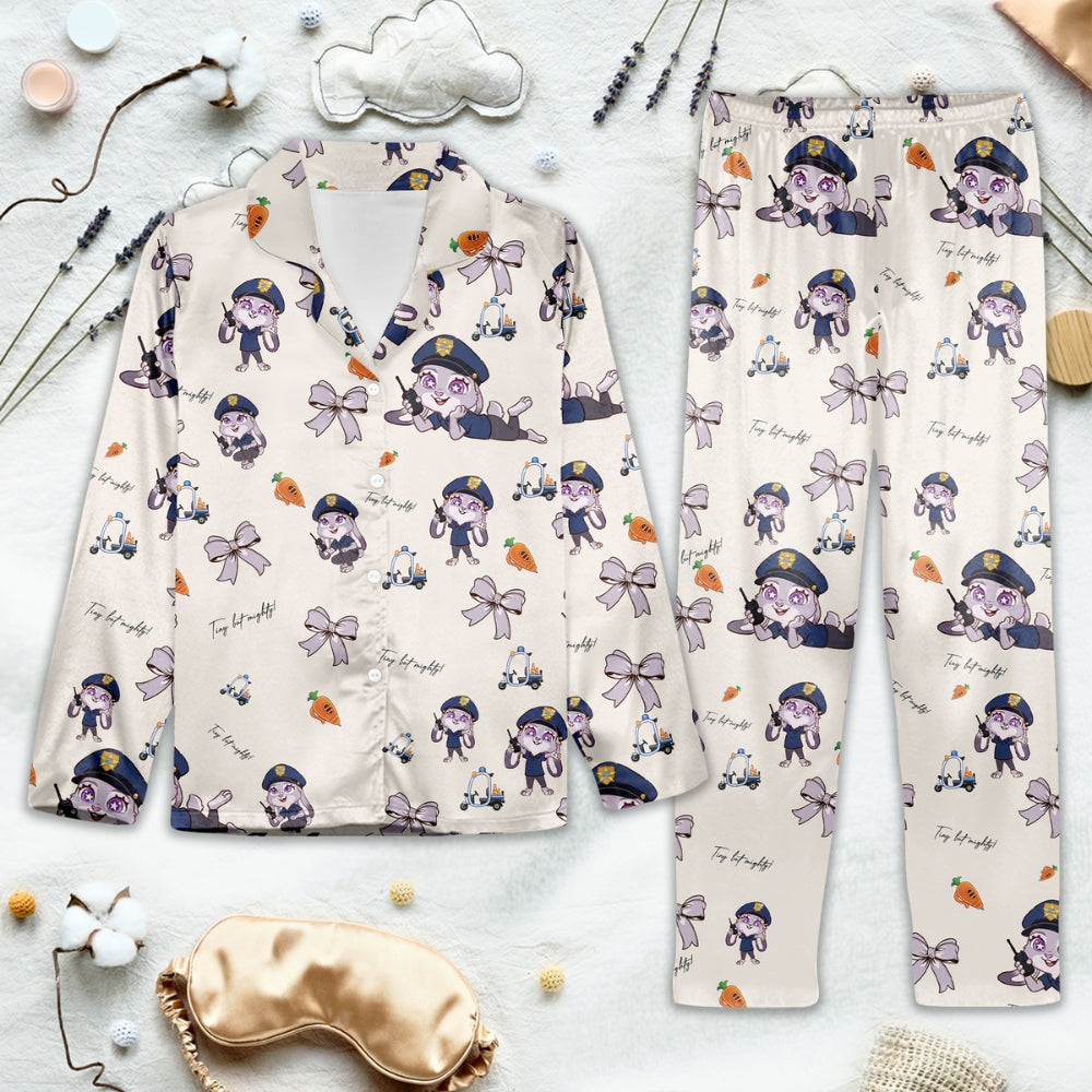 Children's pajama set with cute officer rabbit pattern on a light background